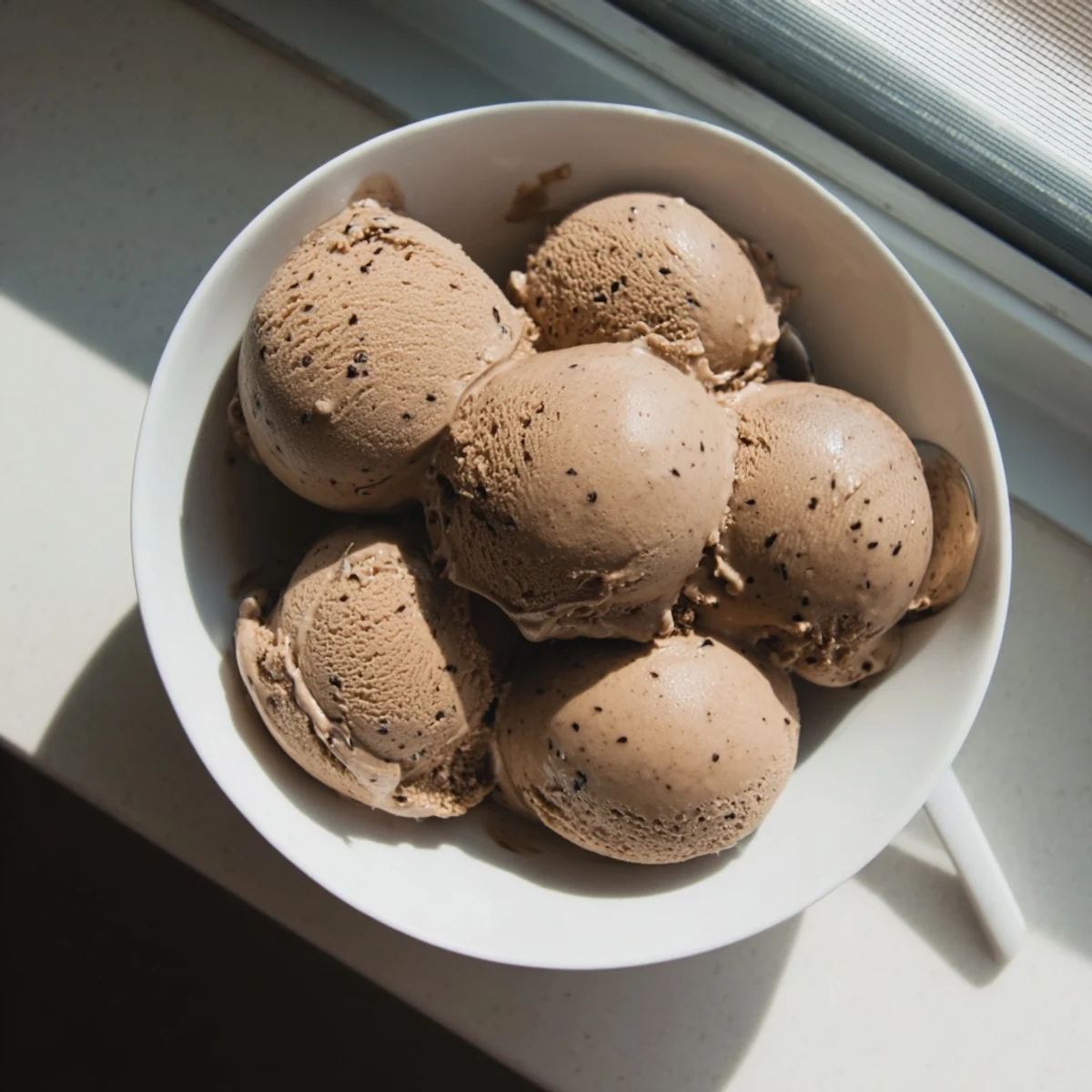 The luscious ice cream swirl features bold coffee flecks and hints of sweetened condensed milk.