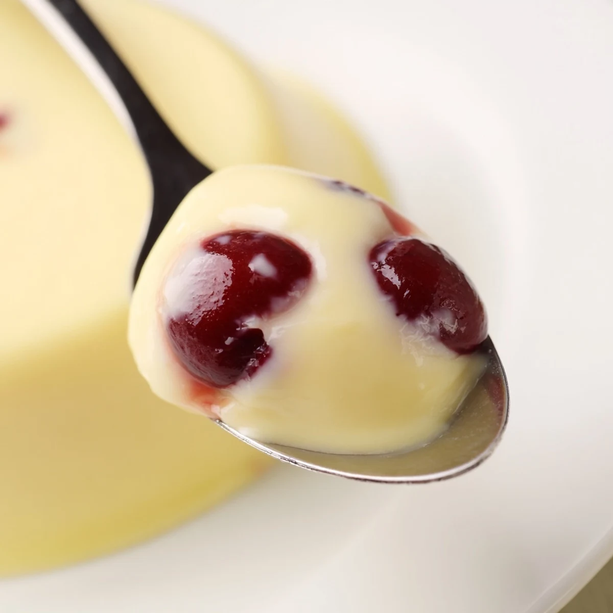 Creamy cherry custard baked until golden and served warm with sweet cherry filling